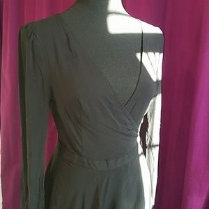 Ecote wrap dress with tulip hem buttoned sleeves
